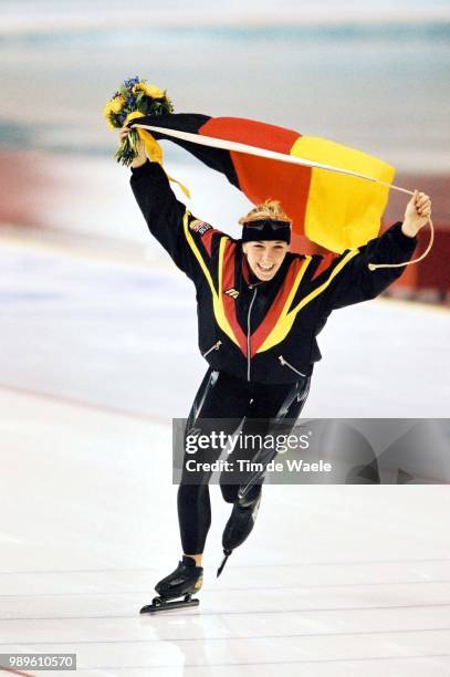 Winter Olympic Games : Salt Lake City, 2/20/02, Kearns, Utah, United States --- German Speed Skater Anni Freisinger Skates A Victory Lap With Her...