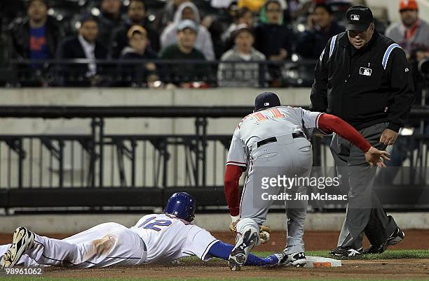Jeff Francoeur of the New York Mets is tagged out by Ryan Zimmerman of the Washington Nationals at third base after a base running mistake during the...