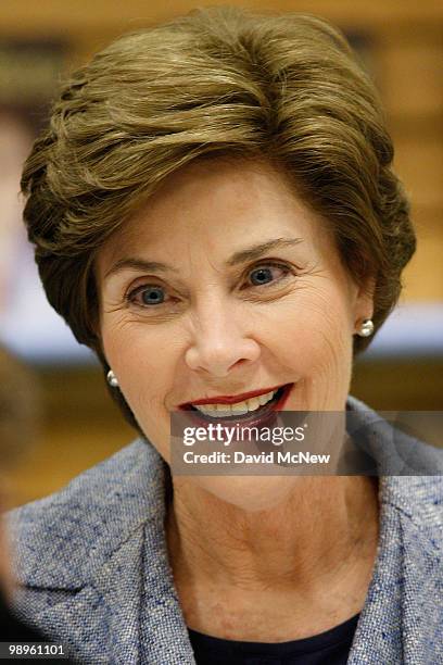 Former US first lady Laura Bush signs books at a Barnes and Noble store during her book tour on May 10, 2010 in Costa Mesa, California. The first...