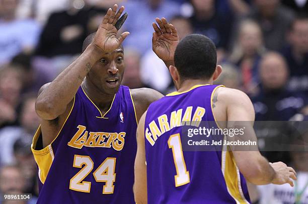 Kobe Bryant of the Los Angeles Lakers celebrates with teammate Jordan Farmar against the Utah Jazz during Game Four of the Western Conference...