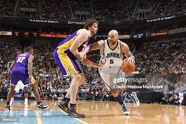 Carlos Boozer of the Utah Jazz drives past Pau Gasol of the Los Angeles Lakers in Game Four of the Western Conference Semifinals during the 2010 NBA...