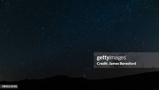 orions belt over thirlmere - orion belt stock pictures, royalty-free photos & images