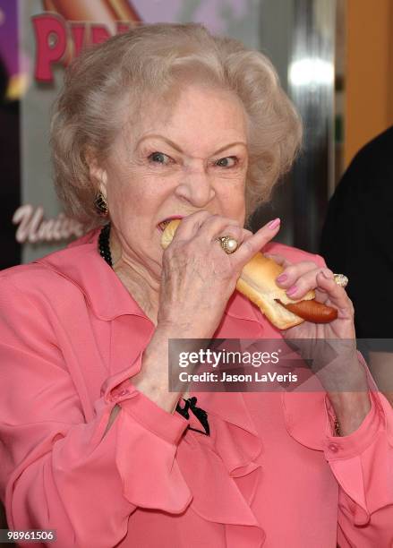 Betty White unveils the "Naked" hot dog at Pink's Hot Dogs at Universal CityWalk on April 19, 2010 in Universal City, California.