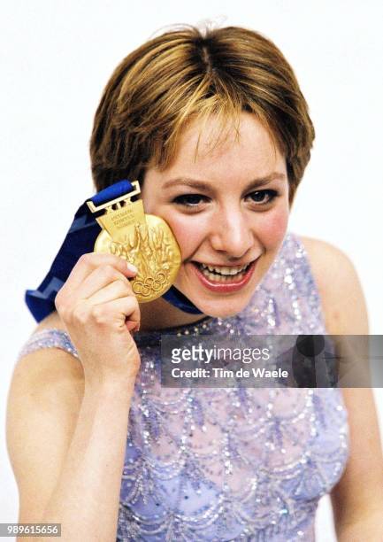 Winter Olympic Games : Salt Lake City, 2/21/02, Salt Lake City, Utah, United States --- Us Figure Skater Sarah Hughes Displays Her Gold Medal Won In...