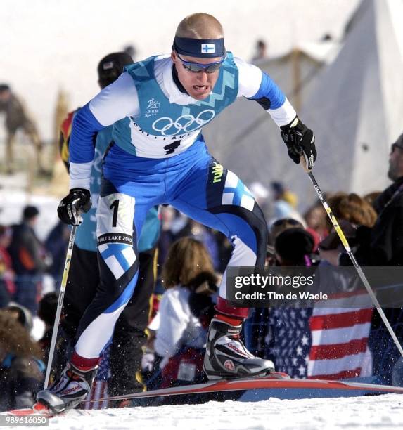 Winter Olympic Games : Salt Lake City, 2/22/02, Midway, Utah, United States --- Finland'S Samppa Lajunen Reaches For The Top Of Horseshoe Hill On His...
