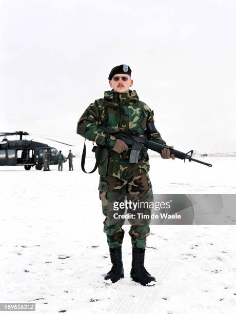 Winter Olympic Games : Salt Lake City, 2/18/02, Utah, United States --- A National Guard Watches Over A Black Hawk Helicopter At An Undisclosed...