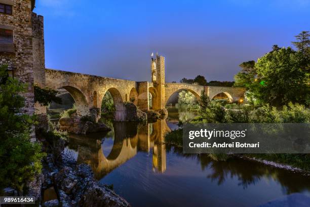 besalu medieval bridge - besalu stock pictures, royalty-free photos & images