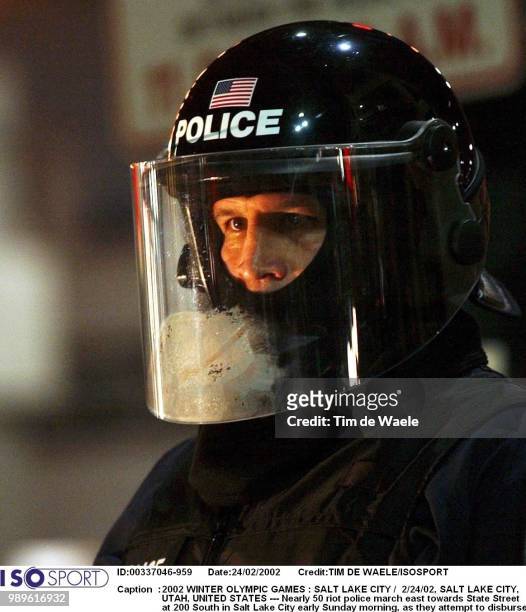 Winter Olympic Games : Salt Lake City, 2/24/02, Salt Lake City, Utah, United States --- Nearly 50 Riot Police March East Towards State Street At 200...