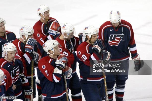 Winter Olympic Games : Salt Lake City, 2/24/02, West Valley City, Utah, United States --- Members Of The Usa Men'S Hockey Team Watch Canada Celebrate...