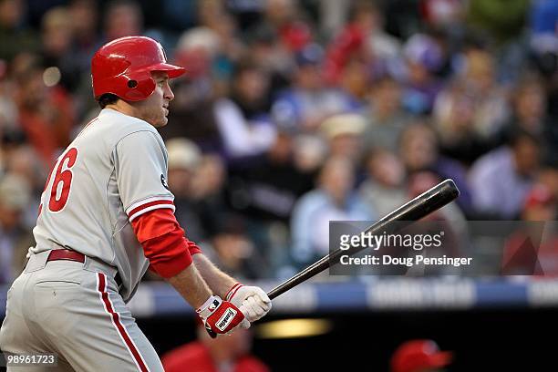 Second baseman Chase Utley of the Philadelphia Phillies takes an at bat against the Colorado Rockies at Coors Field on May 10, 2010 in Denver,...