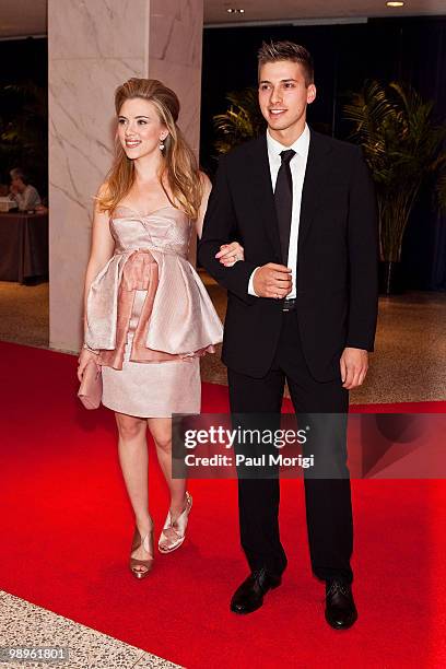 Actress Scarlett Johansson arrives with a guest to the 2010 White House Correspondents' Association Dinner at the Washington Hilton on May 1, 2010 in...