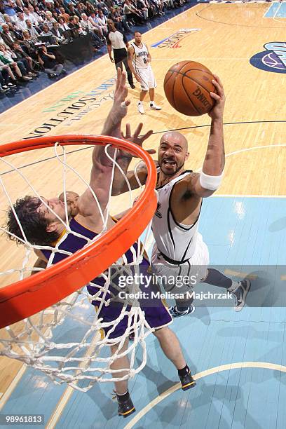 Carlos Boozer of the Utah Jazz goes up for the shot over Pau Gasol of the Los Angeles Lakers in Game Four of the Western Conference Semifinals during...