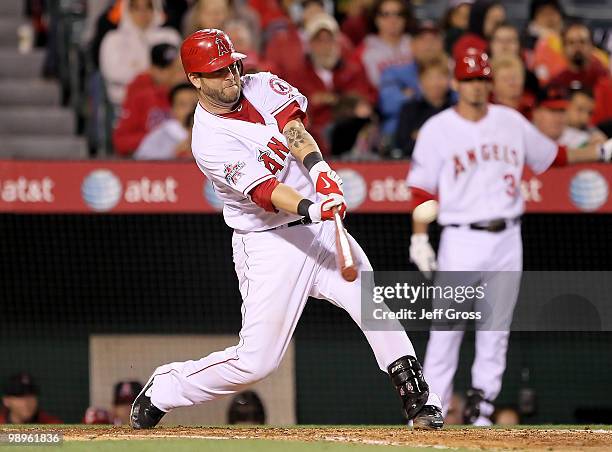 Mike Napoli of the Los Angeles Angels of Anaheim hits a two-run homerun in the fourth inning against the Tampa Bay Rays at Angel Stadium on May 10,...