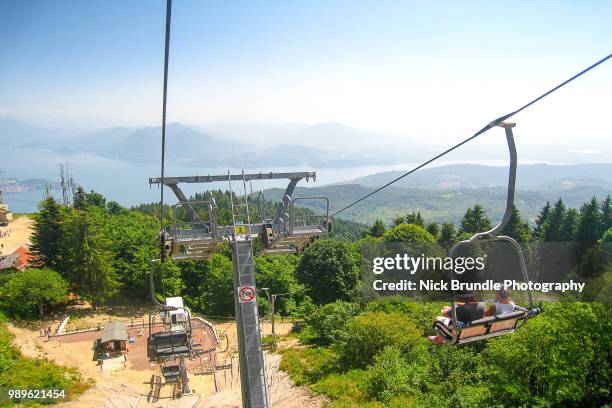 mottarone cable car - lake maggiore, stresa, italy. - borromean islands stock pictures, royalty-free photos & images