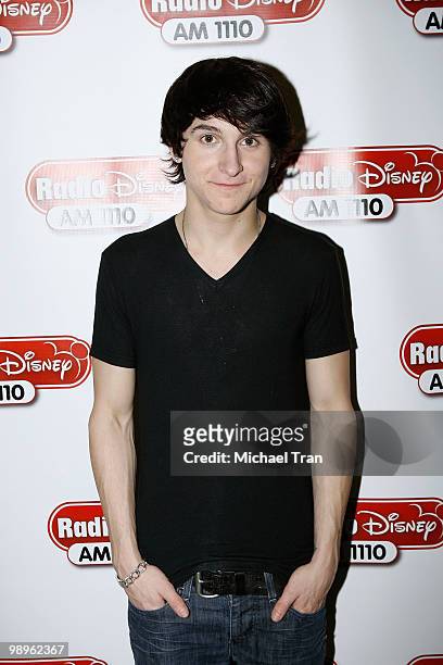 Singer Mitchel Musso poses in the green room at "The 12 Days of Shopping" free holiday concert held at Westfield Culver City Shopping Mall on...