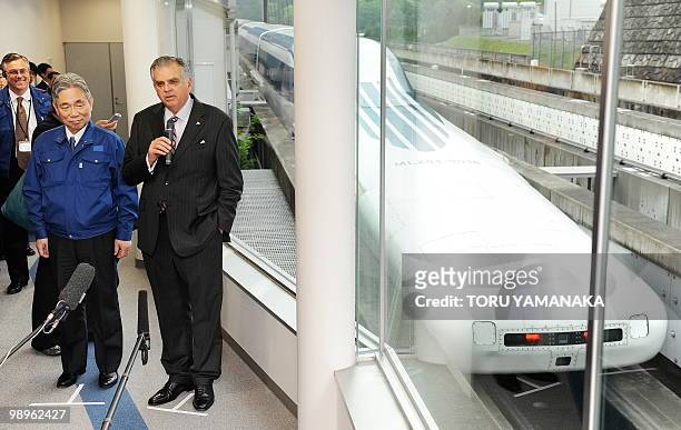 Accompanied by Yoshiyuki Kasai , chairman of Central Japan Railway, US Transport Secretary Ray LaHood answers questions after his test run on the...