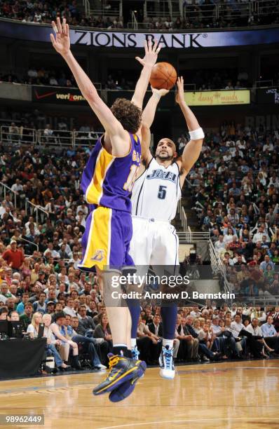 Carlos Boozer of the Utah Jazz puts the shot up over Pau Gasol of the Los Angeles Lakers in Game Four of the Western Conference Semifinals during the...