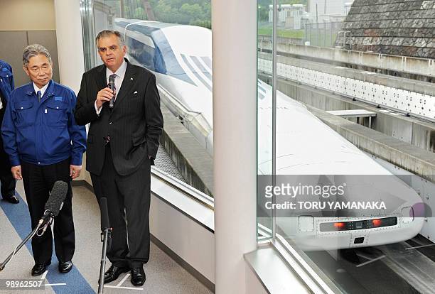 Accompanied by Yoshiyuki Kasai , chairman of Central Japan Railway, US Transport Secretary Ray LaHood answers questions after his test run on the...