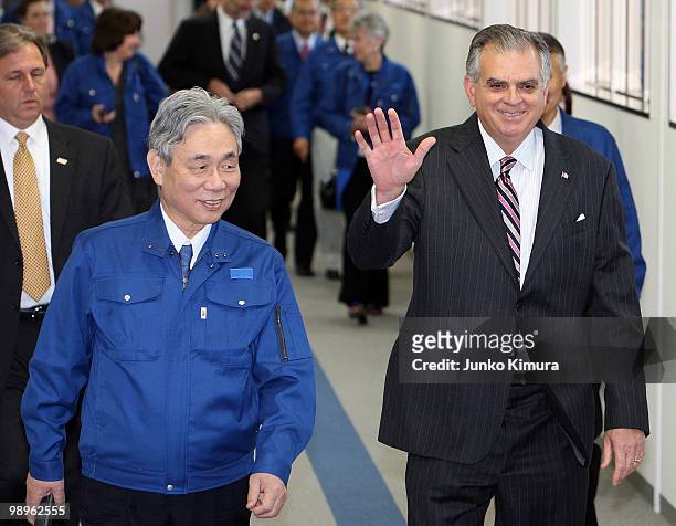 Secretary of Transportation Ray LaHood waves as he attends the test ride of a magnetically levitated train developed by Central Japan Railways Co at...
