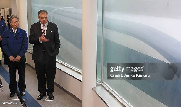 Secretary of Transportation Ray LaHood speaks to reporters as he attends a test ride of a magnetically levitated train developed by Central Japan...