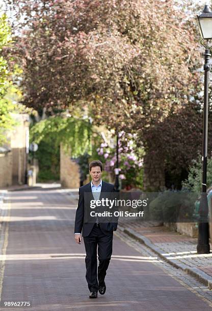 Nick Clegg, the leader of the Liberal Democrat party, walks back to his home after dropping his children off at school on May 11, 2010 in London,...