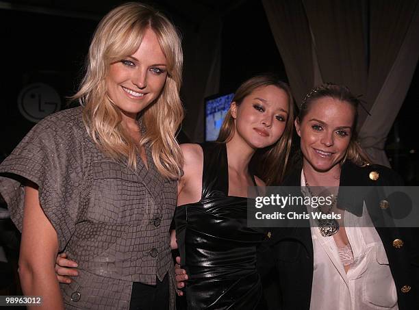 Actresses Malin Akerman, Devin Aoki and Taryn Manning attend a party for "Haute & Bothered" Season 2 hosted by LG Mobile at the Thompson Hotel on May...