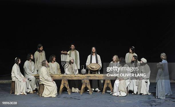 Frederik Mayet in the role of Jesus and residents of the small Bavarian village of Oberammergau perform during a dress rehearsal at Oberammergau's...