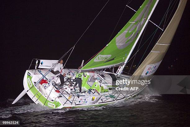 British skipper Samantha Davies and French teammate Romain Attanasio sails their "Saveol" monohull upon their arrival at the harbour of Gustavia, on...