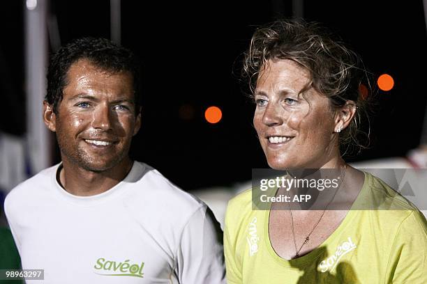 French skipper Romain Attanasio and his teammate and wife British skipper Samantha Davies on the "Saveol" monohull after finishing the AG2R La...