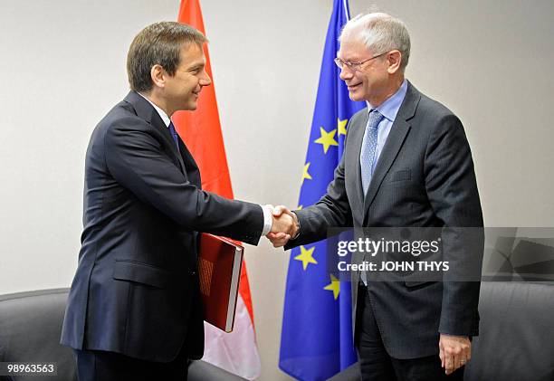 European Council President Herman Van Rompuy welcomes Hungarian Prime minister Gordon Bajnai as he receives a book of prestige of Europe prior to...