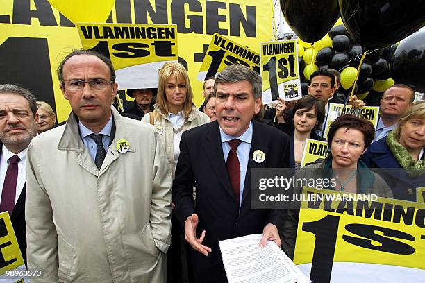 Vlaams Belang Party Chairman Bruno Valkeniers and member Filip Dewinter march during the launching of the Flemish far-right party Vlaams Belang's...