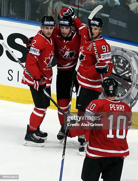 John Tavares of Canada celebrates his team's first goal with team mates Kris Russell , Steve Stamkos and Corey Perry during the IIHF World...