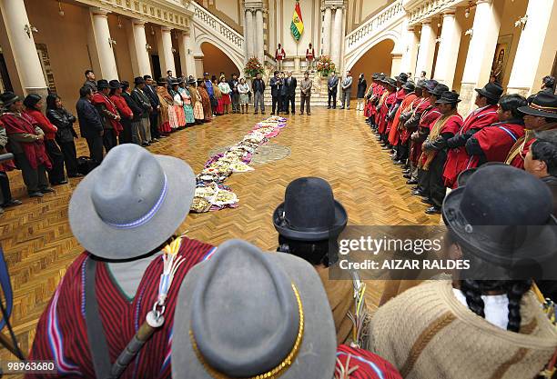 Bolivian President Evo Morales Ayma speaks before taking part in an Apthapi at Quemado presidential palace in La Paz on August 19, 2009. The lunch,...