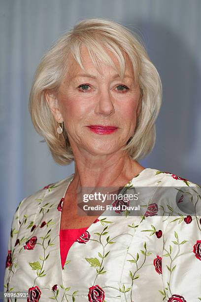 Dame Helen Mirren attends photocall to unveil new waxwork of herself at Madame Tussauds on May 11, 2010 in London, England.