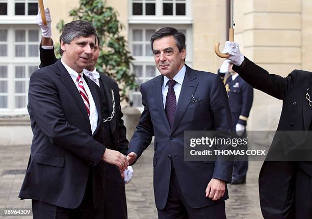 Czech Prime Minister Jan Fischer is welcomed by his French counterpart Francois Fillon at the Hotel Matignon in Paris on May 11, 2010. Fischer, who...
