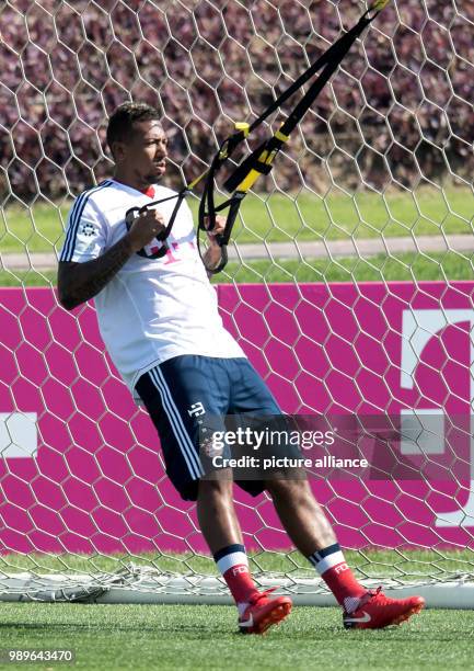 Bayern's Jerome Boateng in action during a training session of the German Bundesliga football club, FC Bayern Munich at their training camp in Doha,...