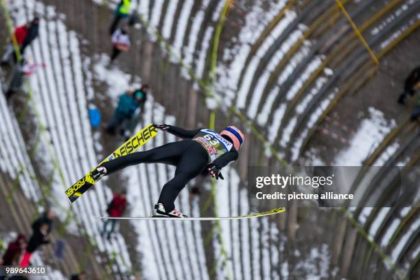 Austria's Stefan Kraft in action during the qualification run of the Four Hills Tournament in Innsbruck, Austria, 03 January 2018. Photo: Daniel...