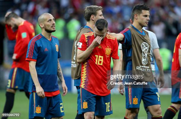 David Silva, Jordi Alba, Cesar Azpilicueta of Spain dejected following the 2018 FIFA World Cup Russia Round of 16 match between Spain and Russia at...