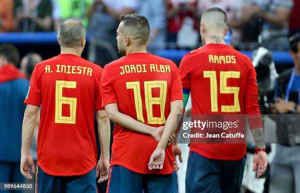 Andres Iniesta, Jordi Alba, Sergio Ramos of Spain dejected following the 2018 FIFA World Cup Russia Round of 16 match between Spain and Russia at...