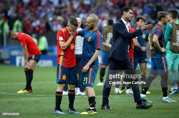 Jordi Alba, David Silva, coach of Spain Fernando Hierro dejected following the 2018 FIFA World Cup Russia Round of 16 match between Spain and Russia...