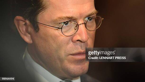 German Defence Minister Karl-Theodor zu Guttenberg is pictured during an informal meeting on northern Afghanistan on May 11, 2010 in Berlin. NATO...