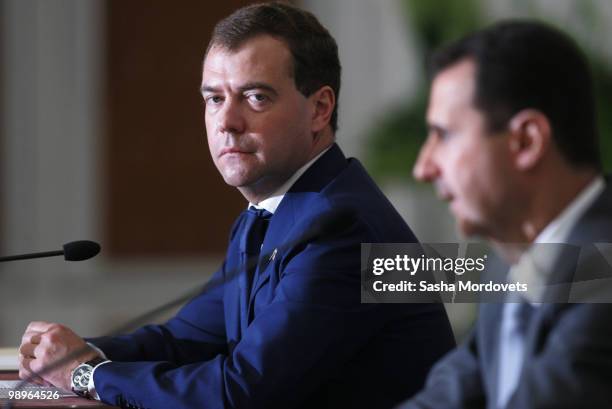 Syrian President Bashar Assad speaks during a press conerence as Russian President Dmitry Medvedev looks on, on May 10, 2010 in Damascus, Syria....