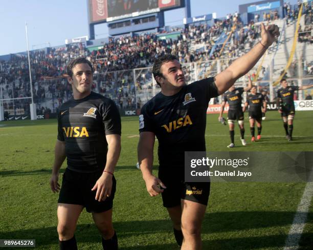 Nicolas Sanchez of Jaguares and Agustin Creevy of Jaguares wave to fans after winning a match between Jaguares and Stormers as part of Super Rugby...