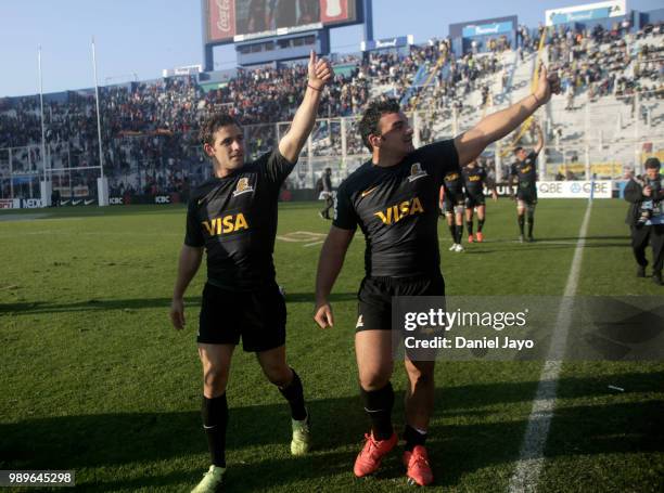 Nicolas Sanchez of Jaguares and Agustin Creevy of Jaguares wave to fans after winning a match between Jaguares and Stormers as part of Super Rugby...