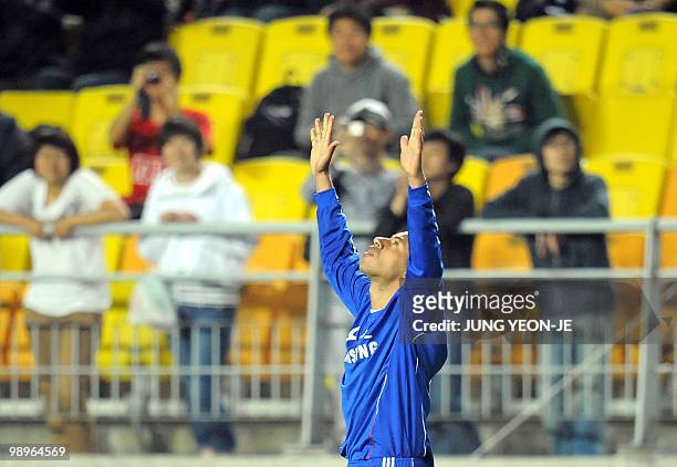 Jose Mota of South Korea's Suwon Bluewings celebrates after a scoring against China's Beijing Guoan during the AFC Champions League round 16 match in...