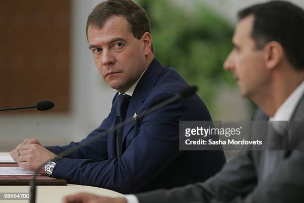 Syrian President Bashar Assad speaks during a press conerence as Russian President Dmitry Medvedev looks on, on May 10, 2010 in Damascus, Syria....