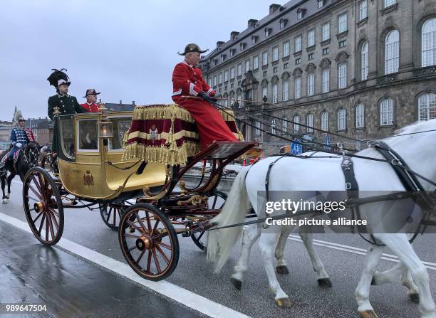 Queen Margrethe II. Of Denmark arrives in a golden carriage for a New Year's reception at Christiansborg Palace in Kopenhagen, Denmark, 4 January...