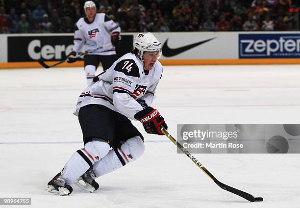 Oshie of USA runs with the puck during the IIHF World Championship group A match between USA and Denmark at Lanxess Arena on May 10, 2010 in Cologne,...