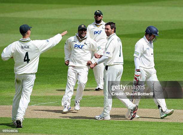 Paul Franks of Nottinghamshire celebrates with team-mates after taking the wicket of Phil Mustard of Durham during the LV County Championship match...