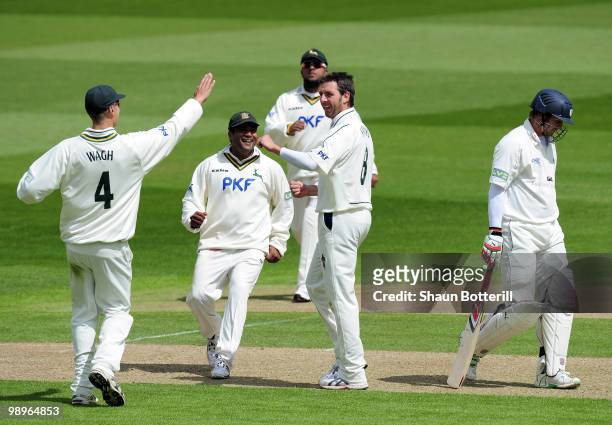 Paul Franks of Nottinghamshire celebrates with team-mates after taking the wicket of Phil Mustard of Durham during the LV County Championship match...